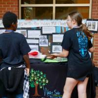 West Side Christian students explain table
